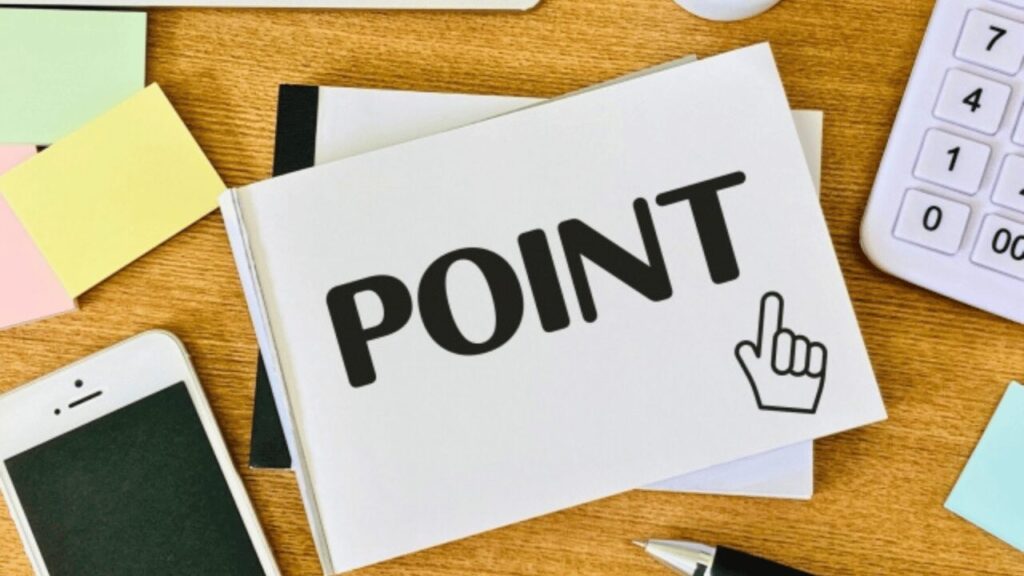 POINTと書かれたノートとスマートフォンと電卓