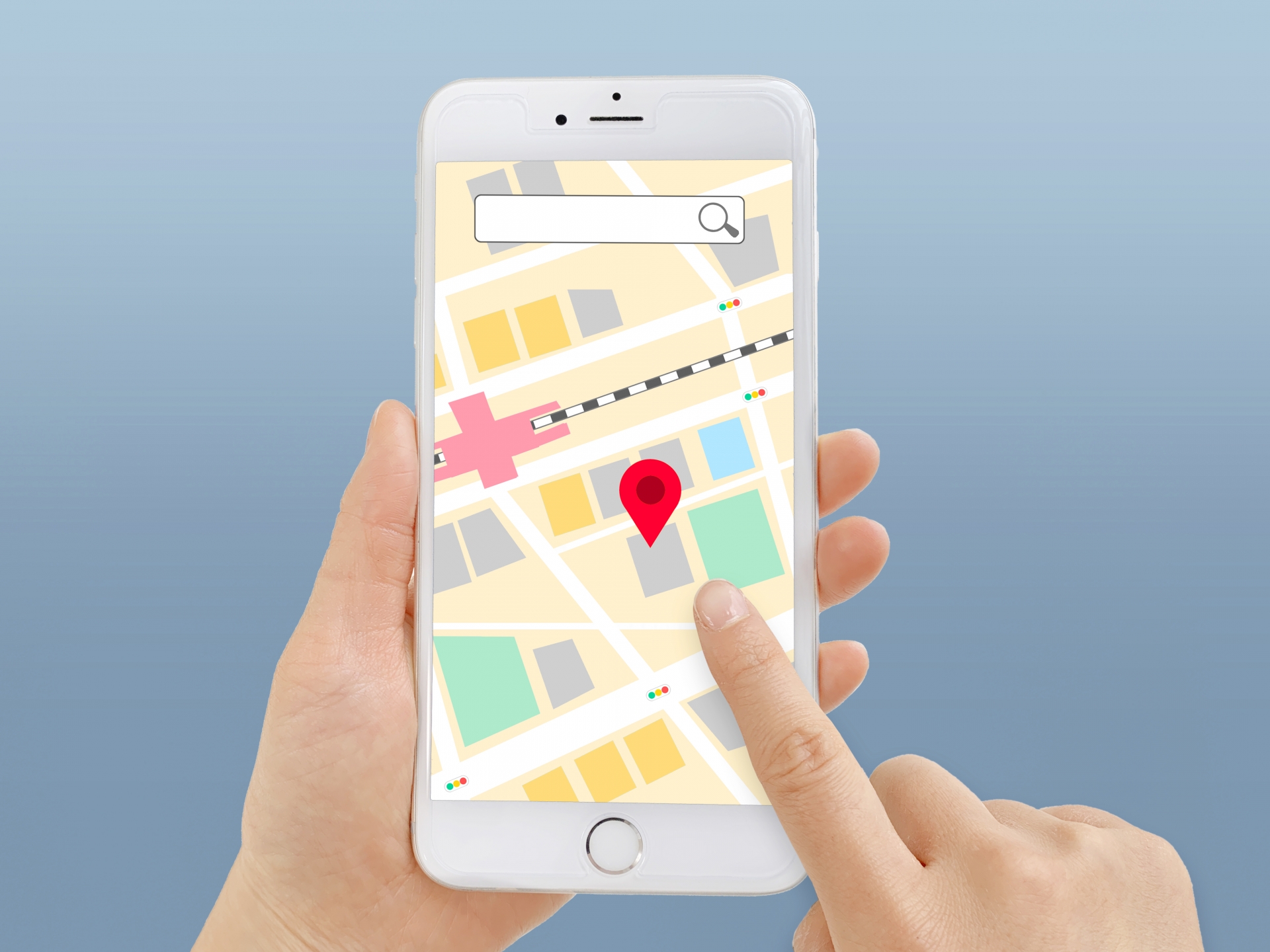 スマートフォンの地図アプリで目的地を検索する手元